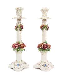 A Pair of Schierholz Porcelain Three-Light Candelabra Height 23 1/2 inches.