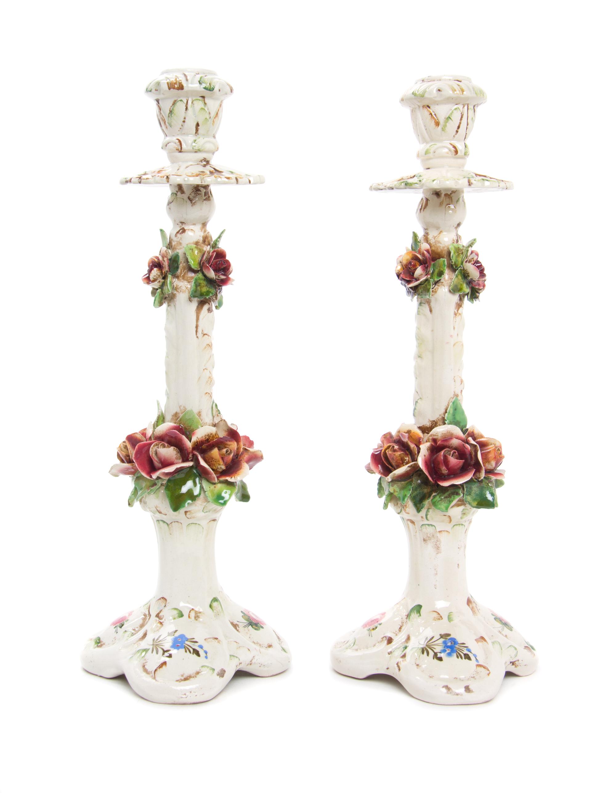 A Pair of Schierholz Porcelain Three-Light Candelabra Height 23 1/2 inches.
