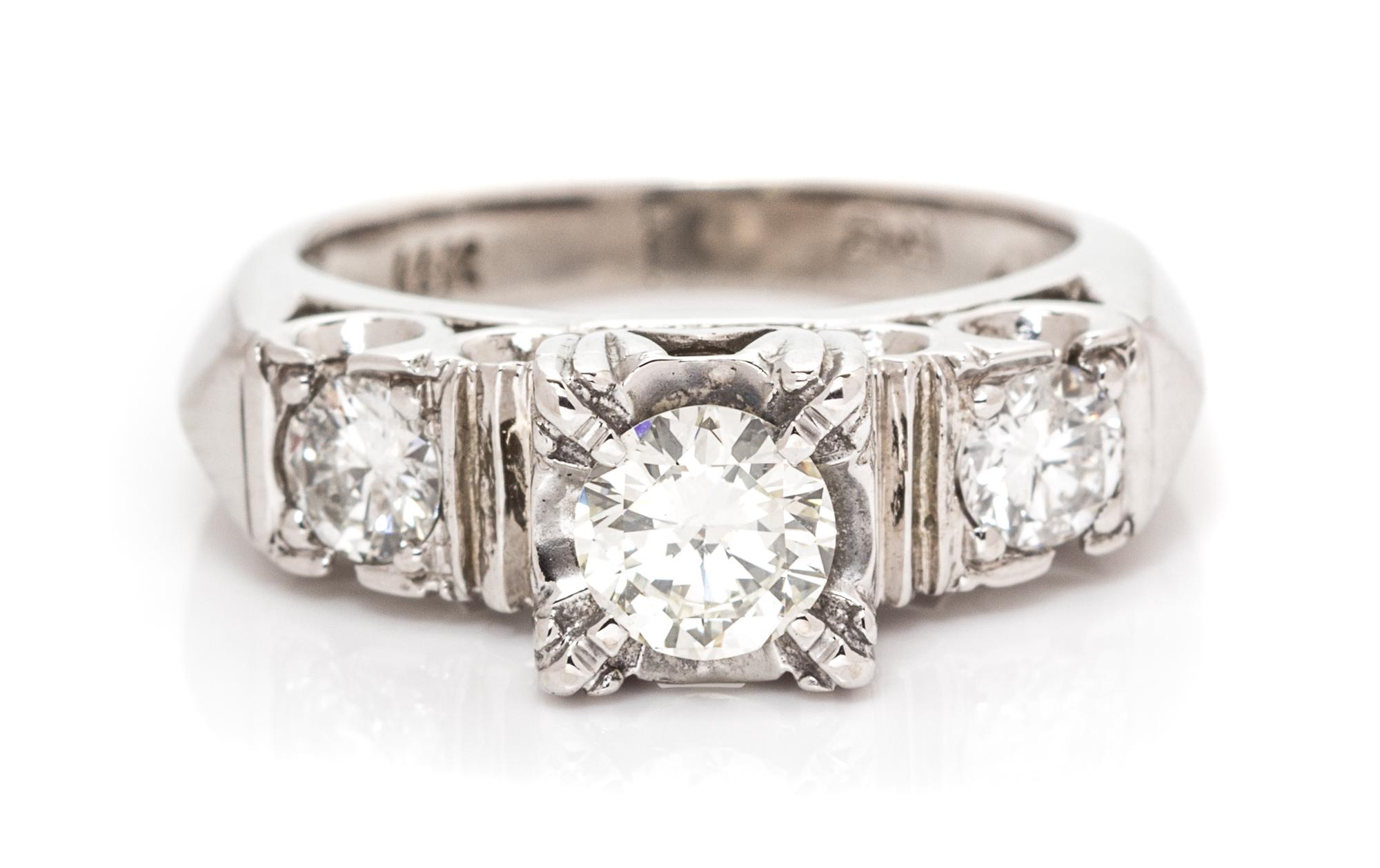 A 14 Karat White Gold and Diamond Ring, 3.60 dwts.