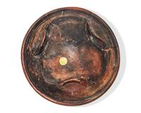 A Dutch Slip-Decorated Earthenware Footed Charger, 17th Century