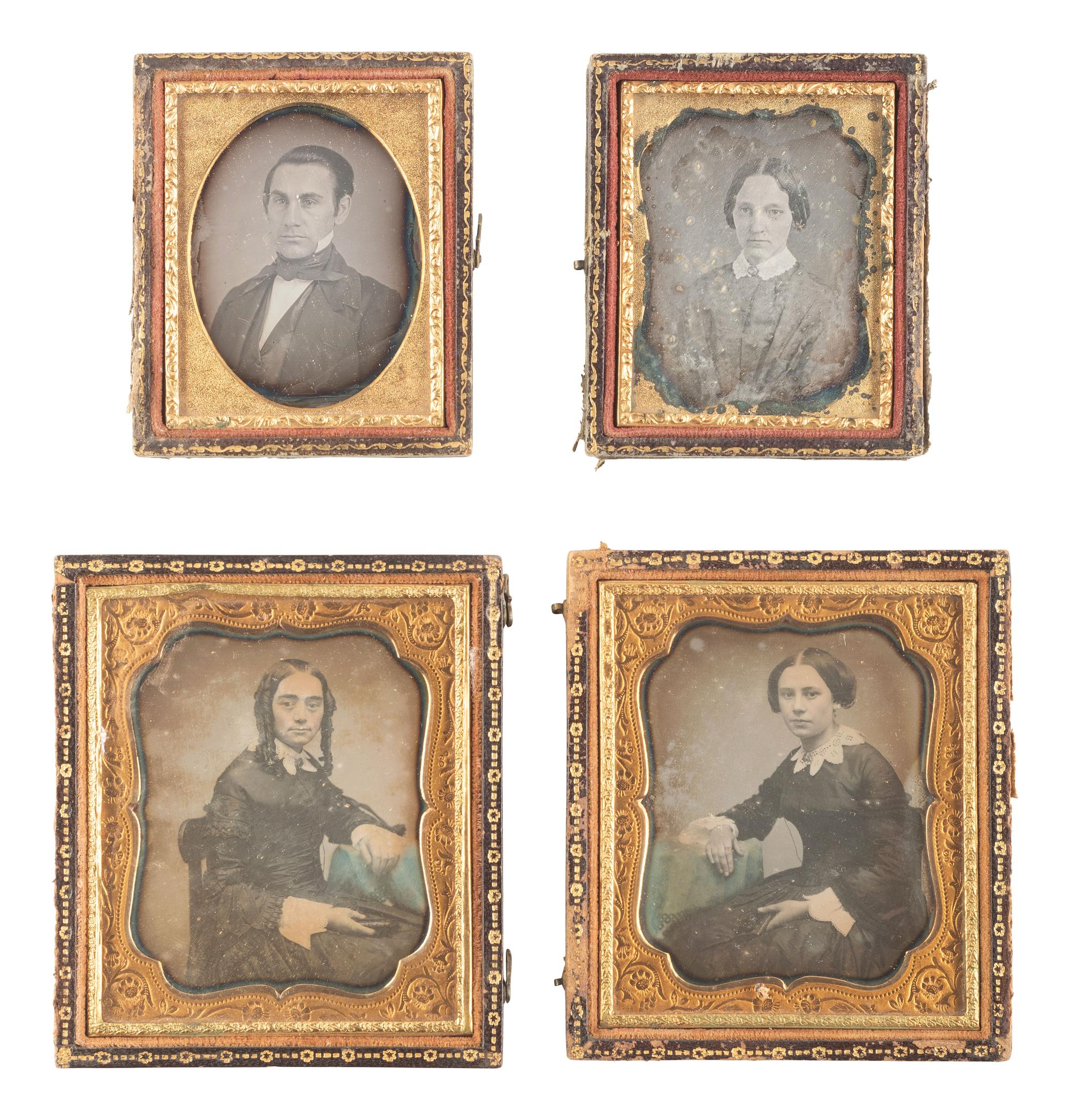 [EARLY PHOTOGRAPHY]. 28 daguerreotypes housed in pairs within side-by-side cases.