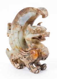 A Chinese Archaistic Jade Figural Carving Height 7 1/2 inches.