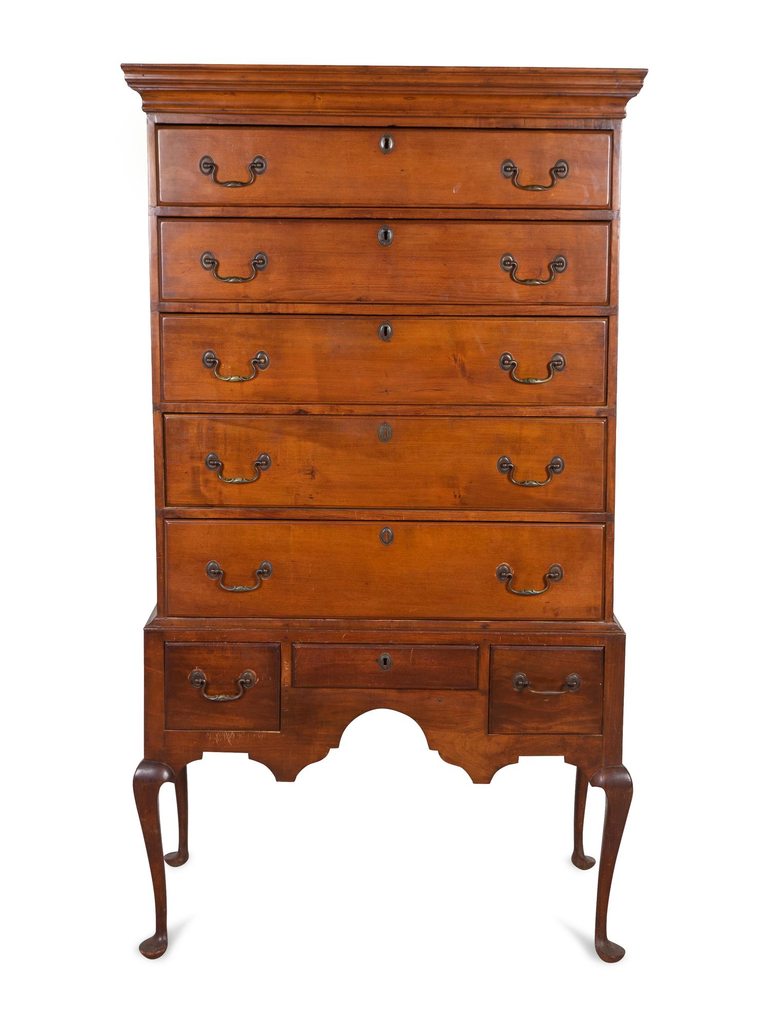 A Queen Anne Cherrywood Flat-Top Highboy — THIRD QUARTER 18TH CENTURY