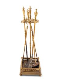 A Set of Brass Fireplace Tools