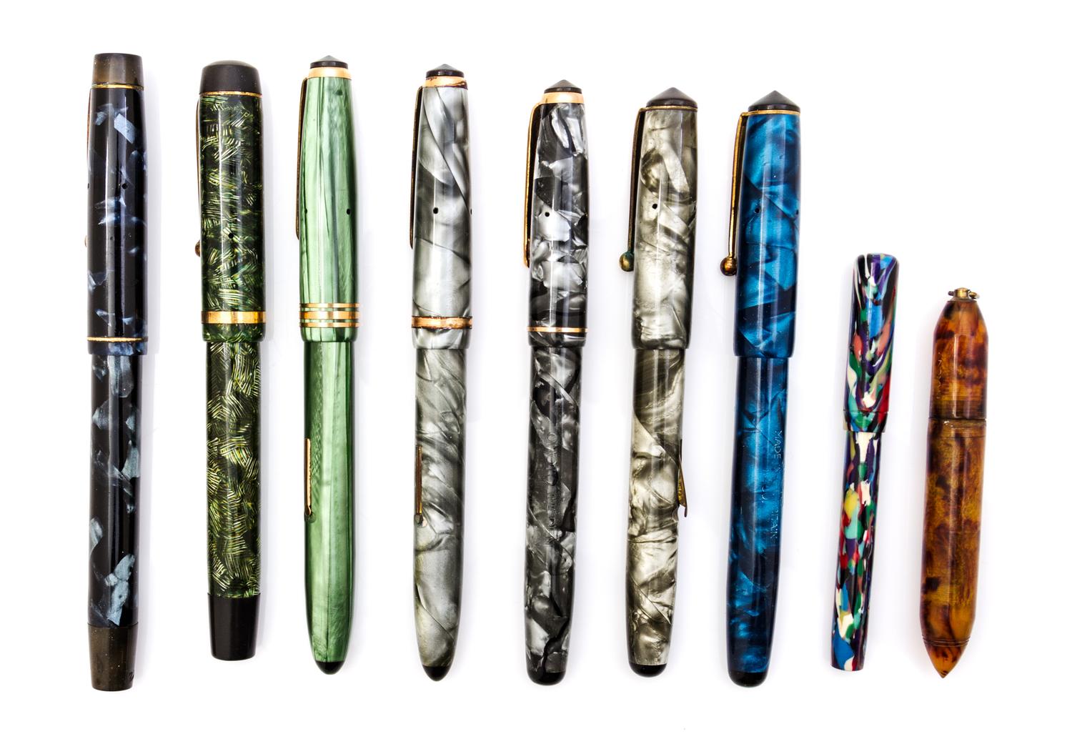 A Collection of Nine Onoto Fountain Pens Length of longest 5 1/4 inches.