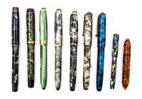 A Collection of Nine Onoto Fountain Pens Length of longest 5 1/4 inches.