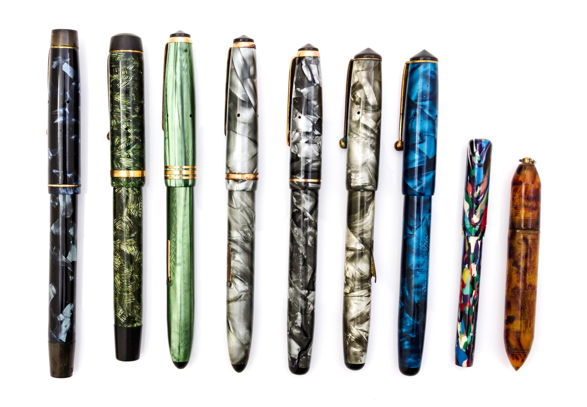 A Collection of Nine Onoto Fountain Pens Length of longest 5 1/4 inches.