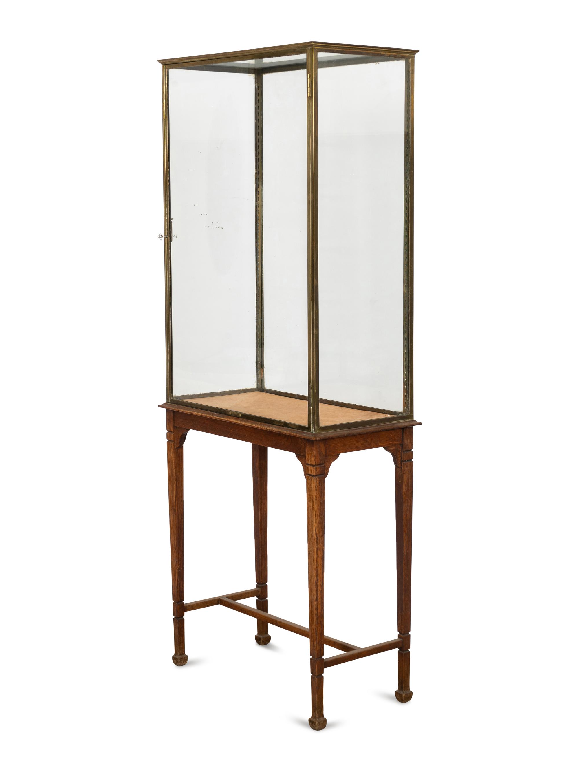 An A. Ravenel Parisian Brass and Glass Retailer's Window Vitrine on Oak Stand