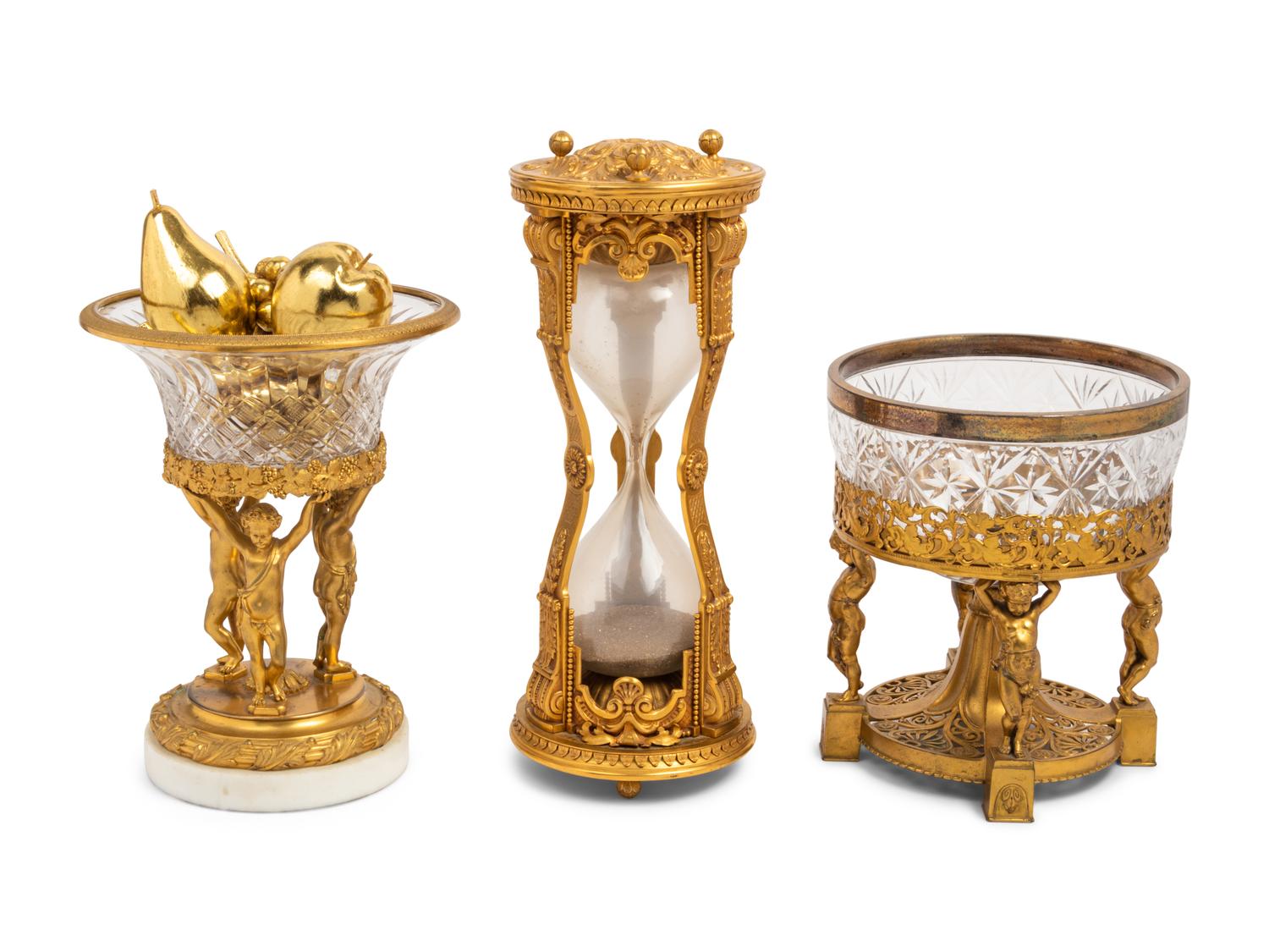 A French Gilt Bronze Mounted Hourglass and Two Associated Figural Centerpiece Bowls