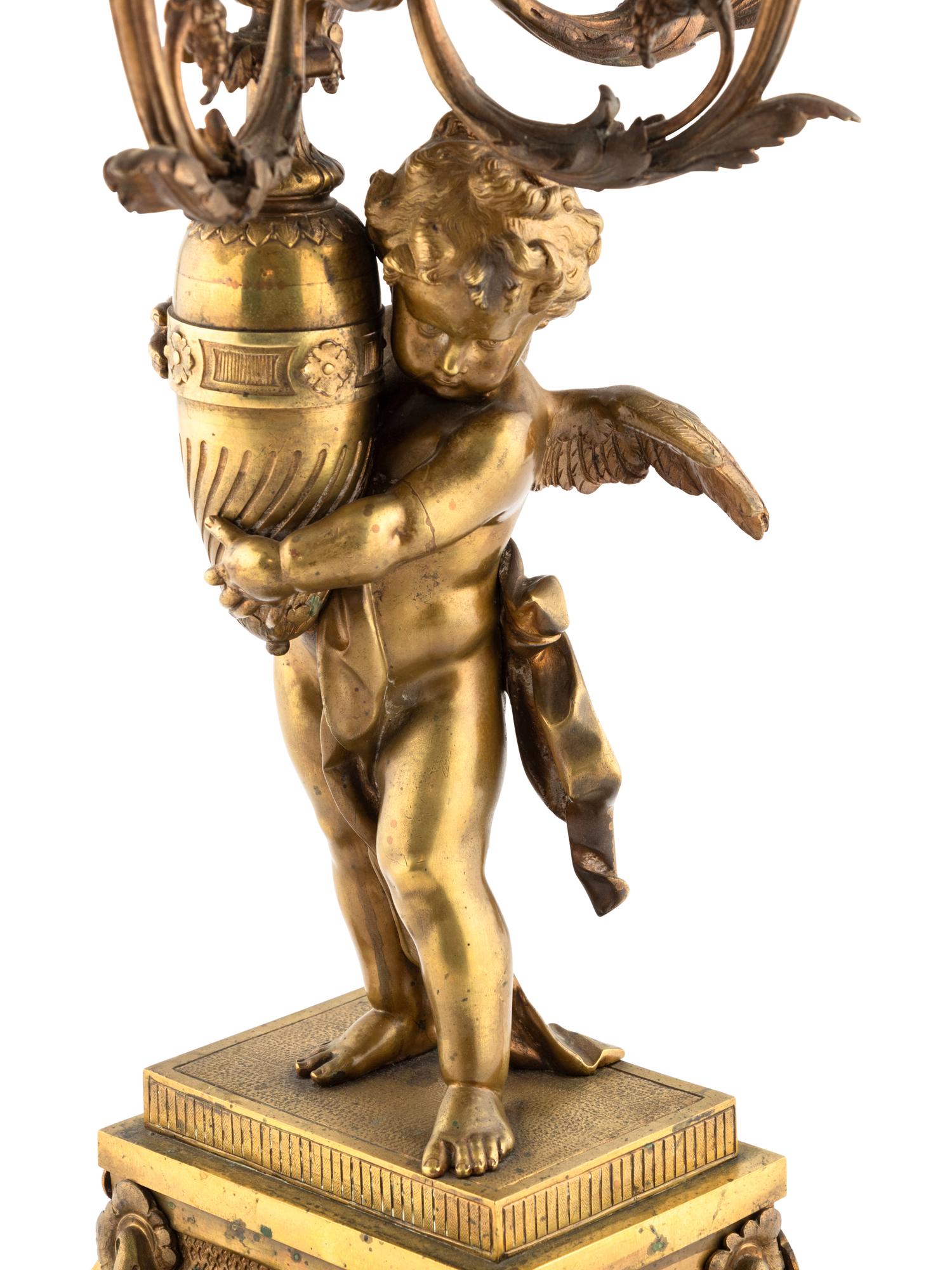 A French Gilt Bronze Figural Ten-Light Candelabrum