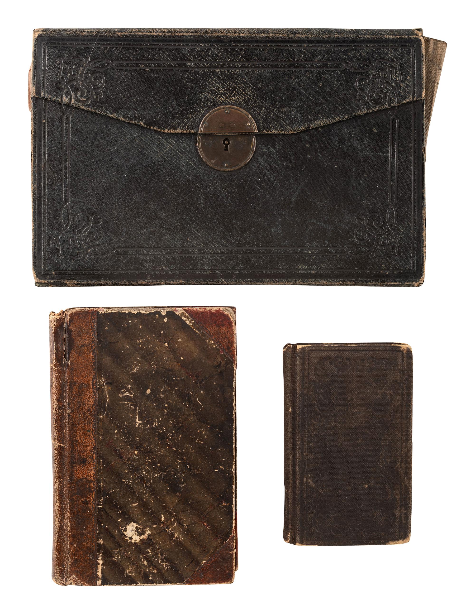 [CIVIL WAR]. A group of 4 items, highlighted by a quarter plate tintype of a Union infantryman posed with an American flag attributed as Joseph Graff, Company D, 23rd Kentucky Infantry.