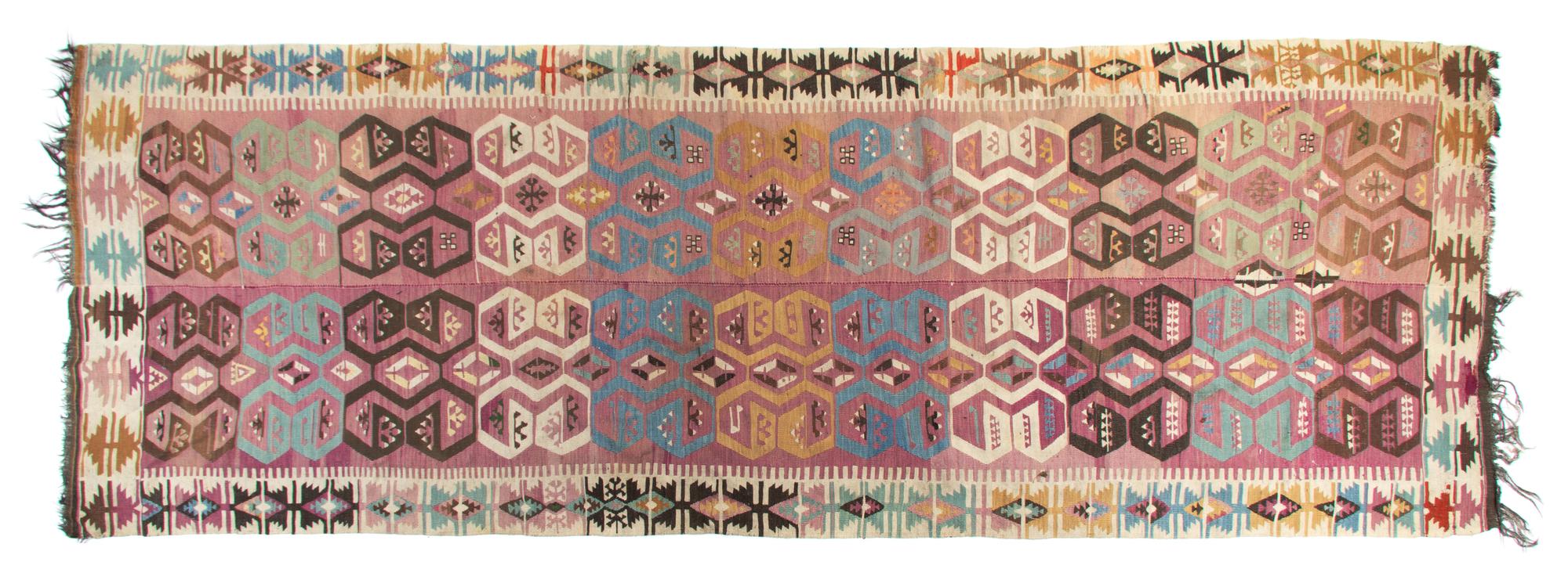 A Turkish Kilim Wool Rug 13 feet 3 inches x 4 feet 7 inches. — CIRCA 1880