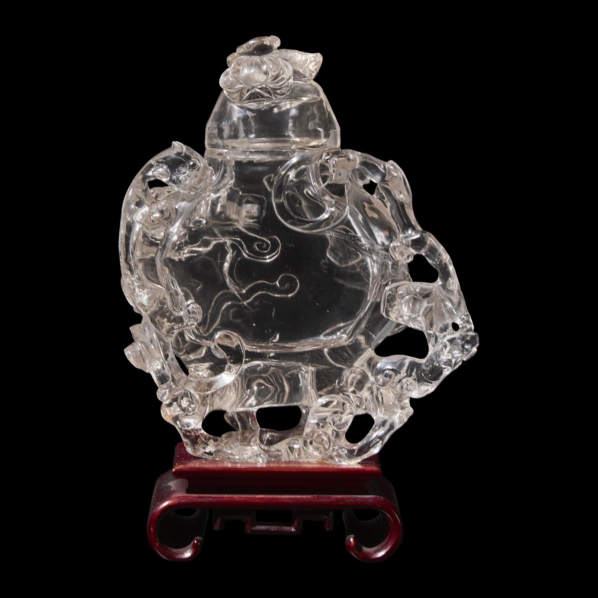 A Chinese Rock Crystal Vase and Cover Carved with Clouds, 20th Century 近代 高浮雕螭龍紋水晶扁壺