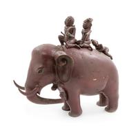 An Indian Bronze Figural Group of Elephant and Riders Height 14 inches. — 19TH CENTURY