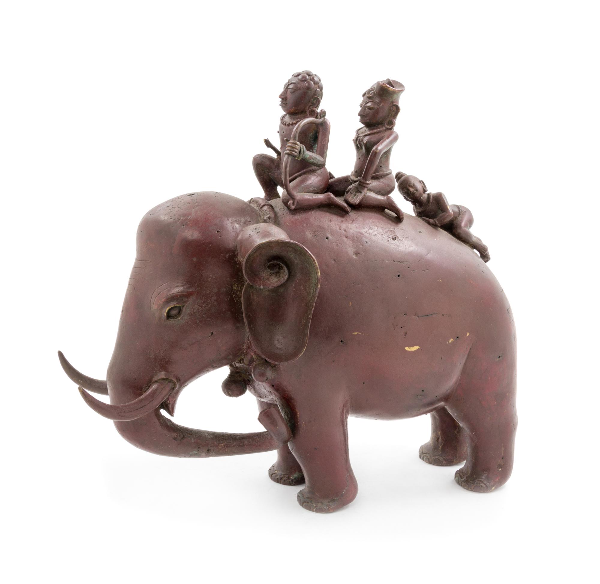 An Indian Bronze Figural Group of Elephant and Riders Height 14 inches. — 19TH CENTURY