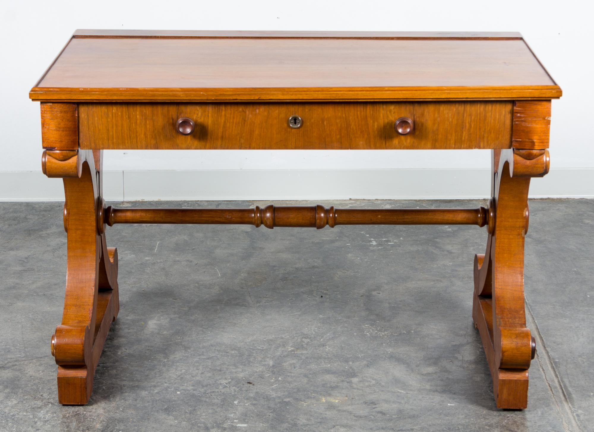 A Regency Style Writing Table Height 29 3/4 x width 43 3/4 x depth 25 inches.