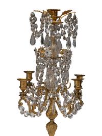 A Pair of Gilt-Bronze and Crystal Five-Light Candelabra