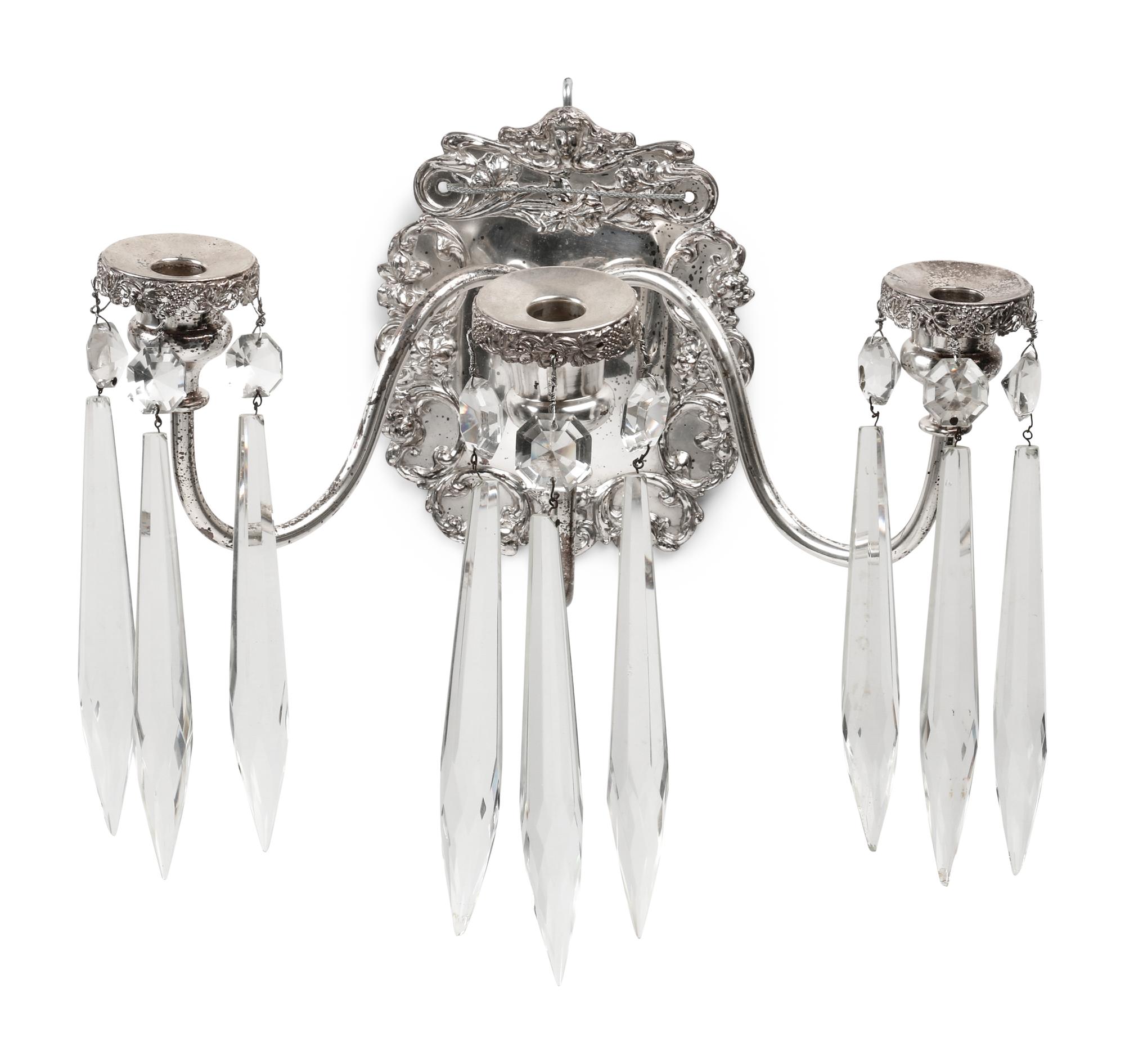 A Pair of Silvered Metal Three-Light Sconces