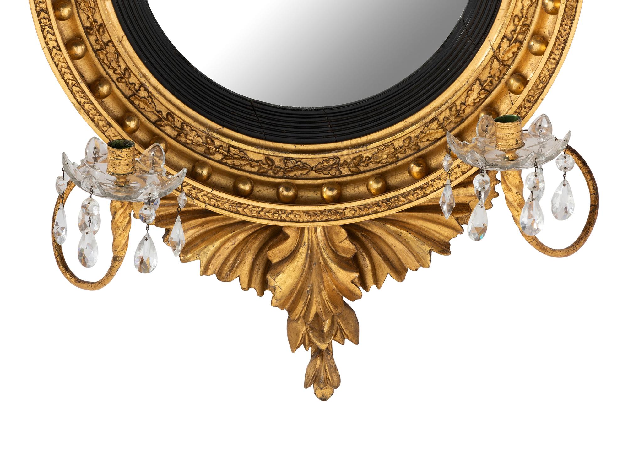 A Classical Giltwood and Gesso Cut-Glass Mounted Two Light Girandole Bull's Eye Mirror