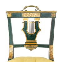 A Set of Eight Continental Green Painted and Parcel Gilt Lyre-Back Dining Chairs