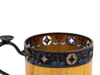 A Russian Enameled Silver Coffee Cup and Saucer