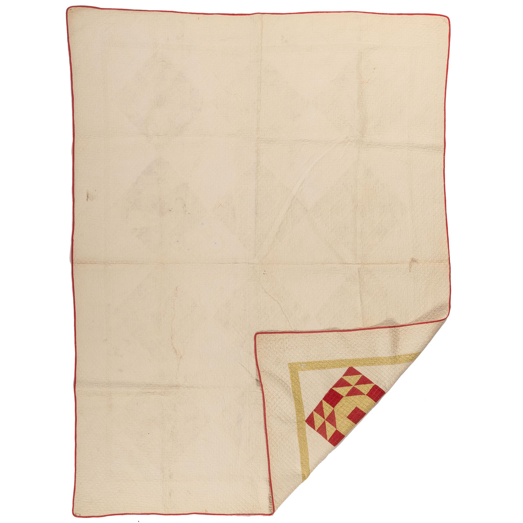 A Diamond Pattern Pieced Quilt
