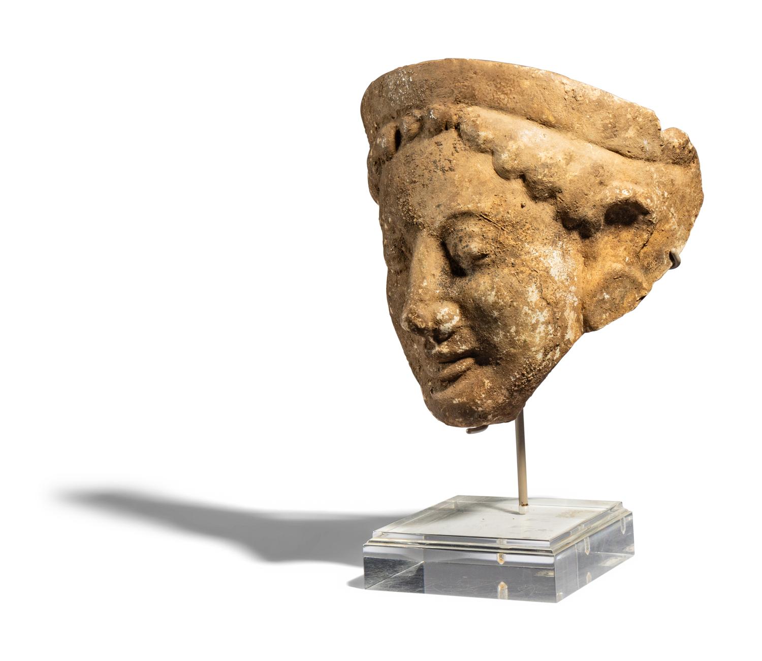 A Greek Terracotta Head with Stephane