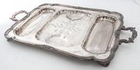 A Group of Silver-Plate Serving Trays Width of widest over handles 30 inches.