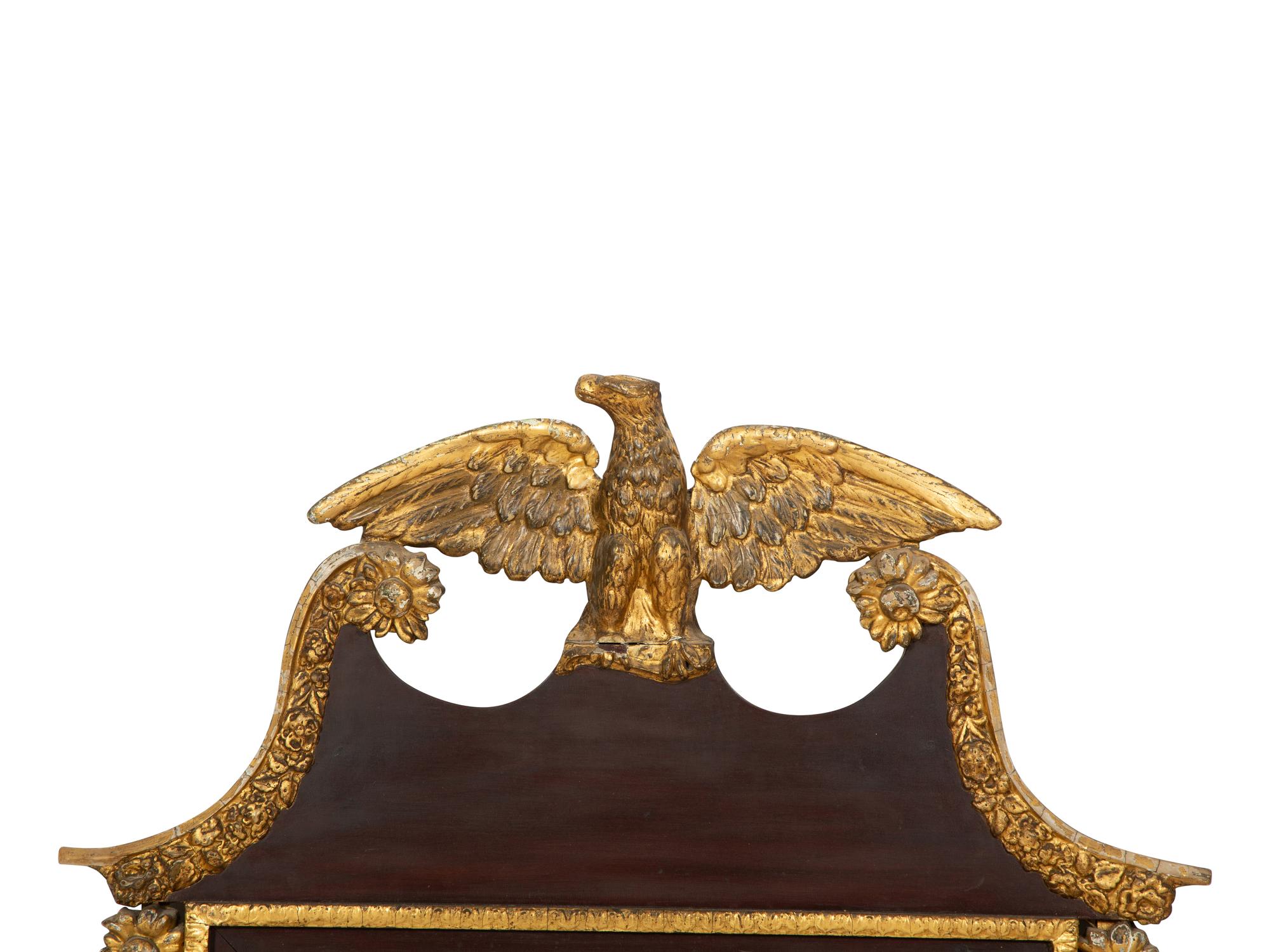 A George III Style Parcel Gilt Mahogany Mirror
