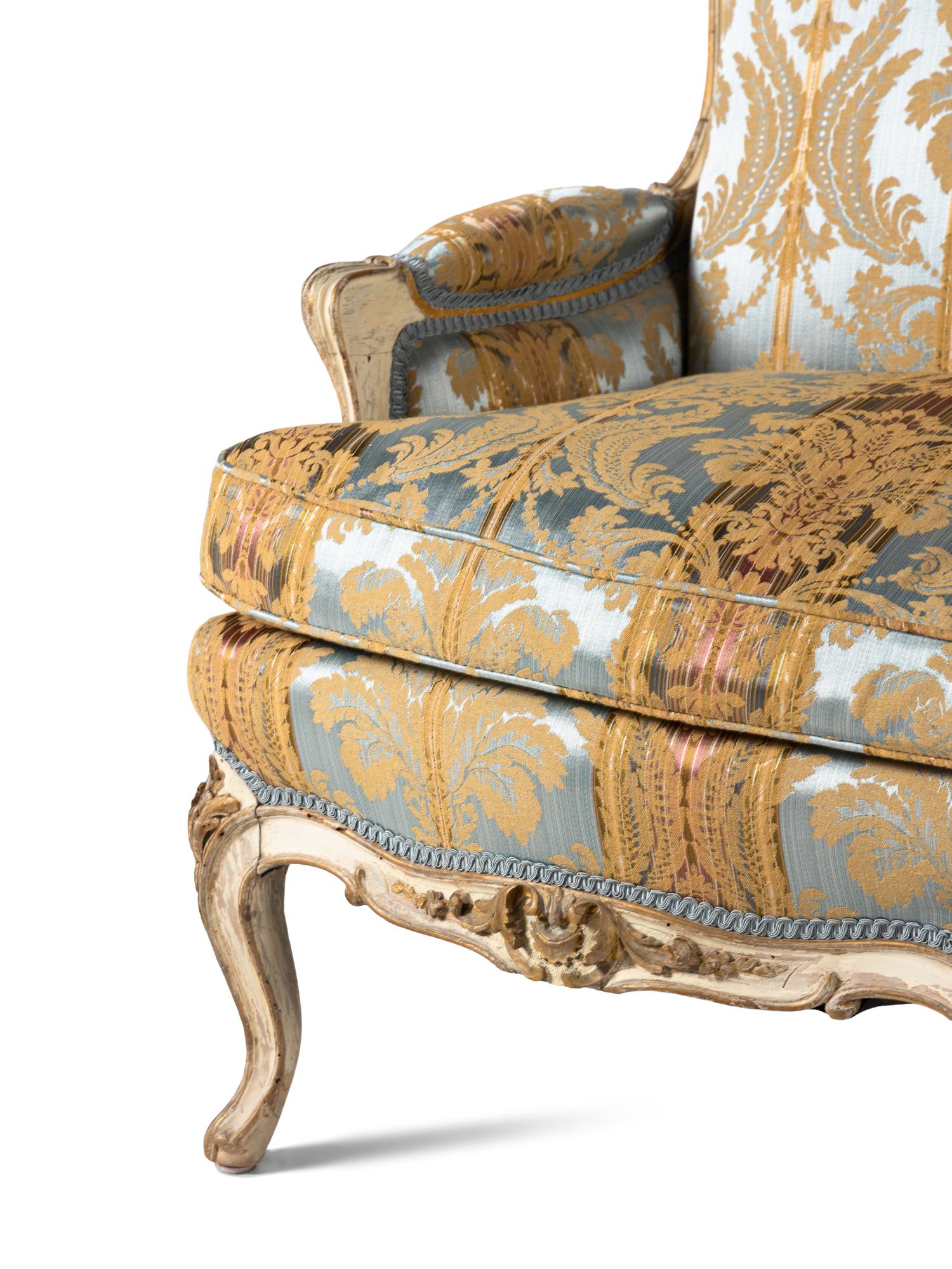 A Louis XV Style Cream Painted and Parcel Gilt Canapé