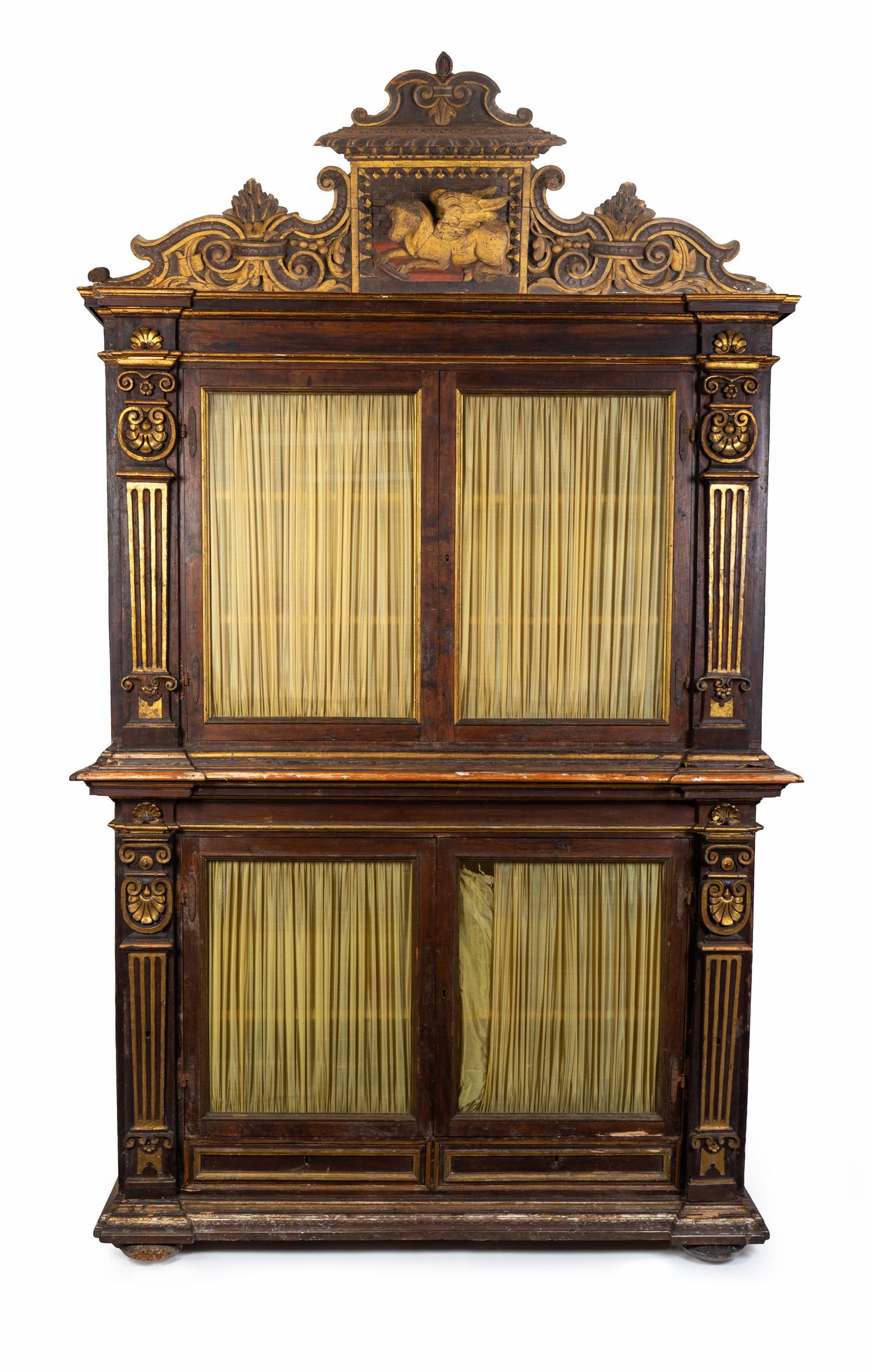 An Italian Neoclassical Parcel-Gilt and Carved Walnut Bookcase — LATE 18TH CENTURY