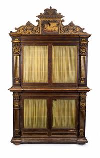 An Italian Neoclassical Parcel-Gilt and Carved Walnut Bookcase — LATE 18TH CENTURY