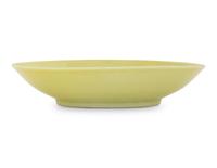 A Small Lemon-Yellow Glazed Porcelain Saucer Dish