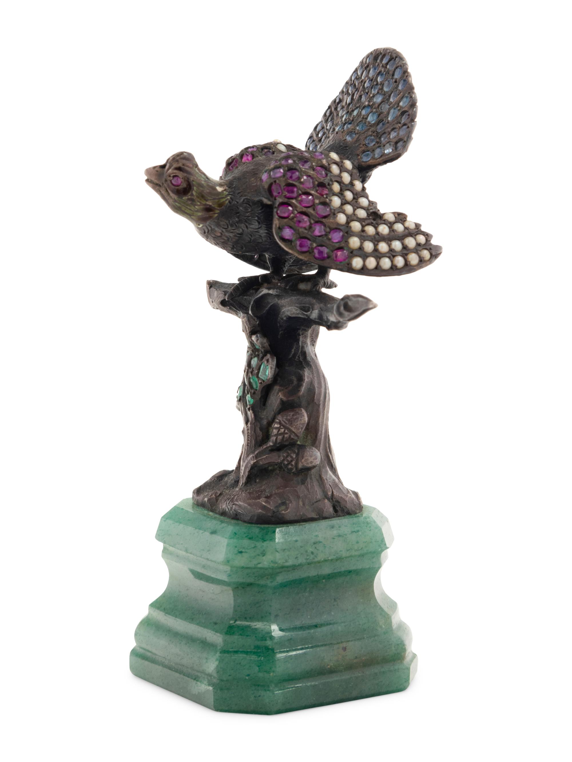 A Continental Silver, Pearl and Hardstone Inset Figure
