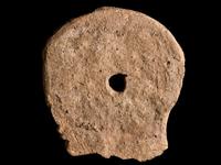 An Etruscan Terracotta Votive Half-Head