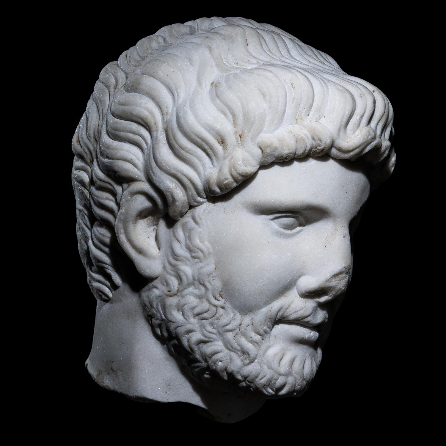 An Over Life-Size Roman Marble Portrait Head of Emperor Hadrian