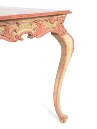 An Italian Baroque Style Pink and Cream Painted Center Table