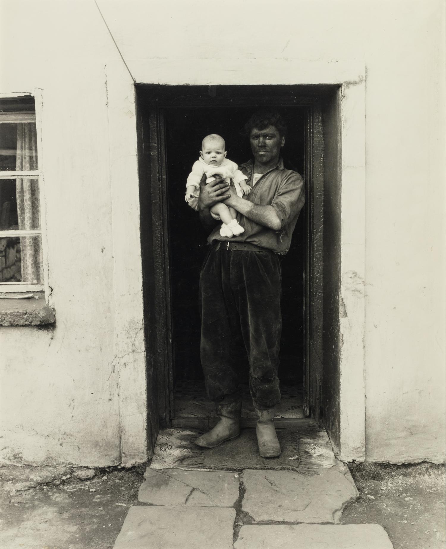 Bruce Davidson (born 1933) Wales (Coal Miner and Baby), 1965