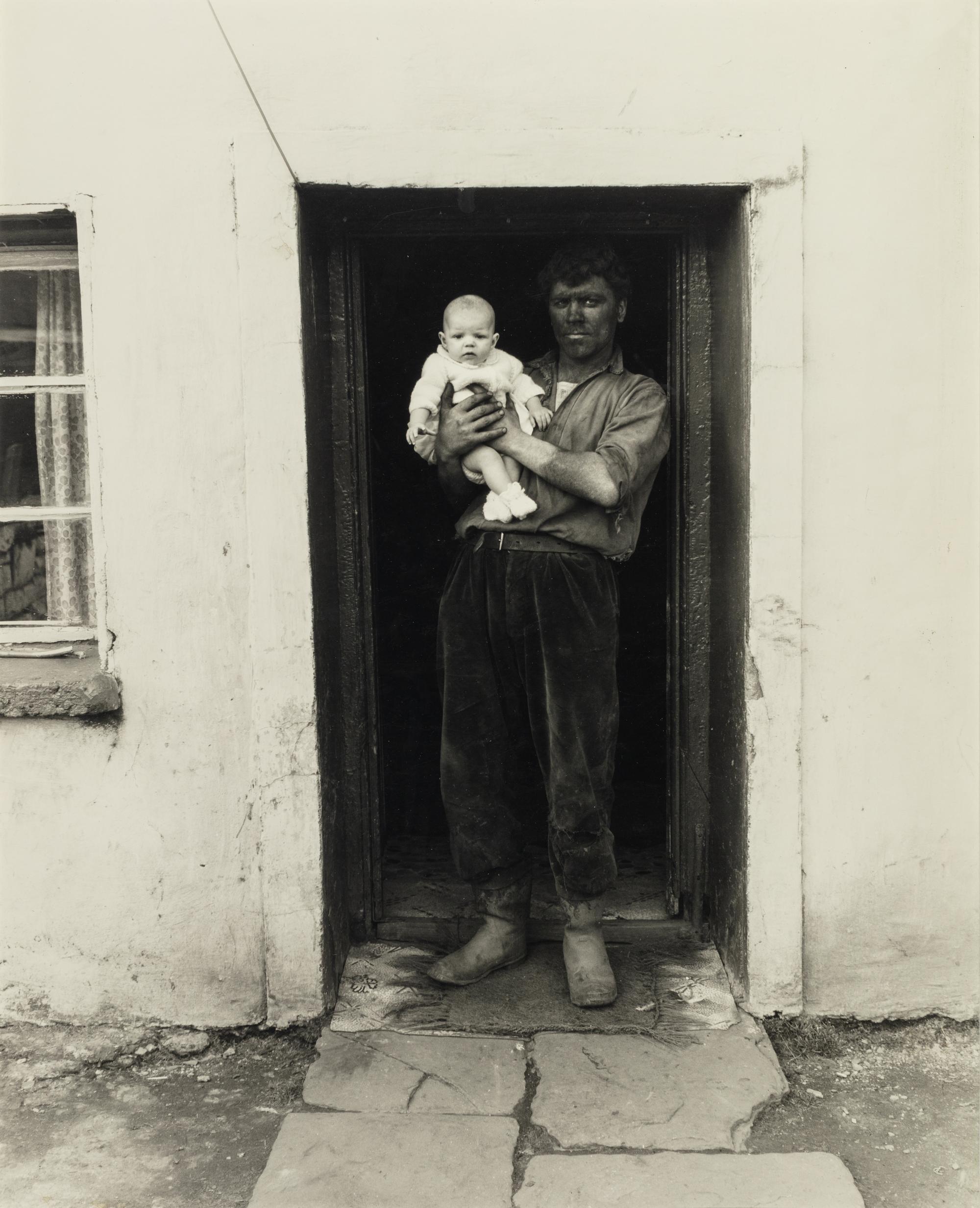 Bruce Davidson (born 1933) Wales (Coal Miner and Baby), 1965