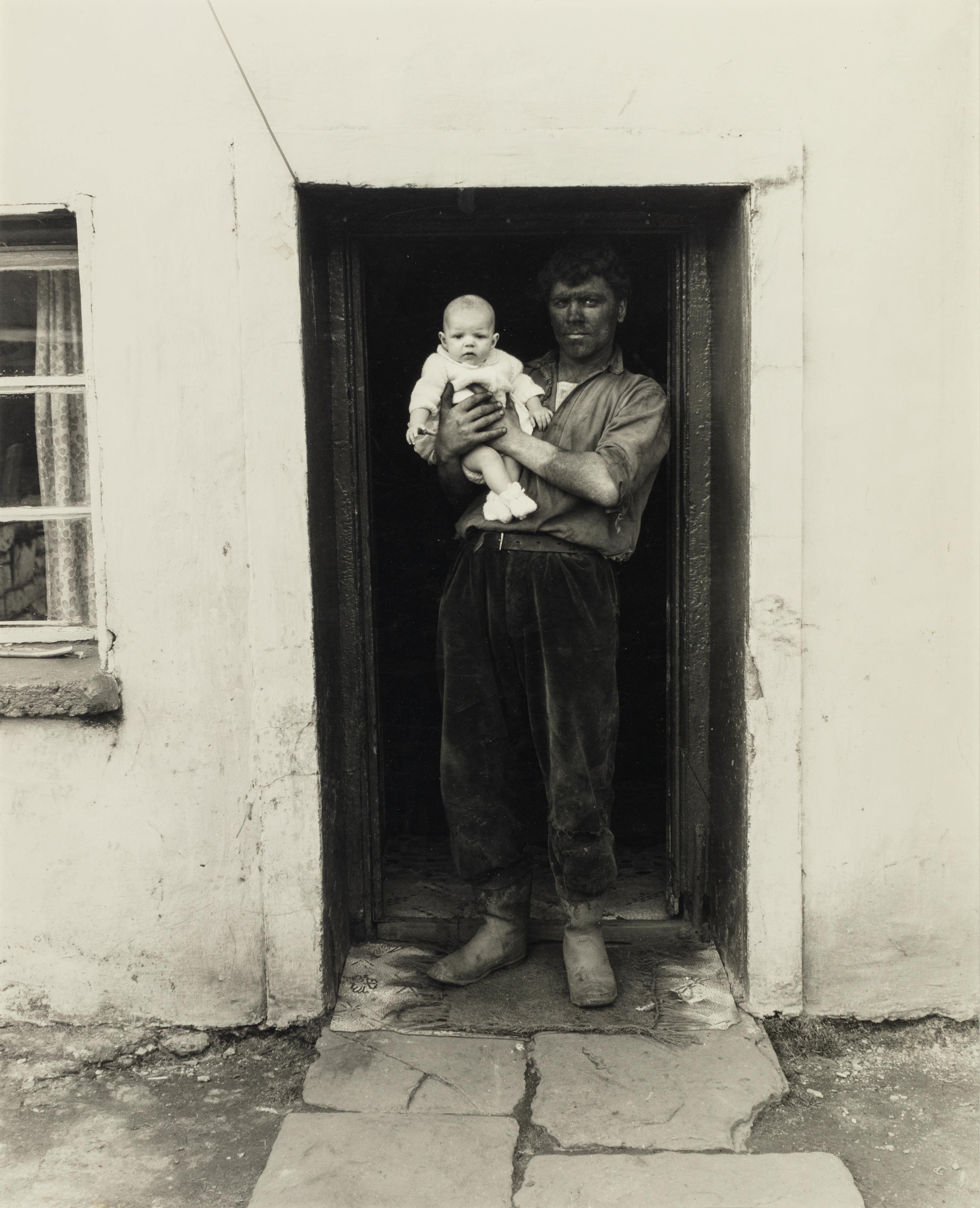 Bruce Davidson (born 1933) Wales (Coal Miner and Baby), 1965