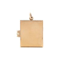 THE 'MAMIE EISENHOWER' YELLOW GOLD LOCKET CHARM