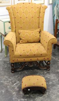 A Jacobean Style Oak Wingback Chair Height 45 1/2 inches. — 20TH CENTURY