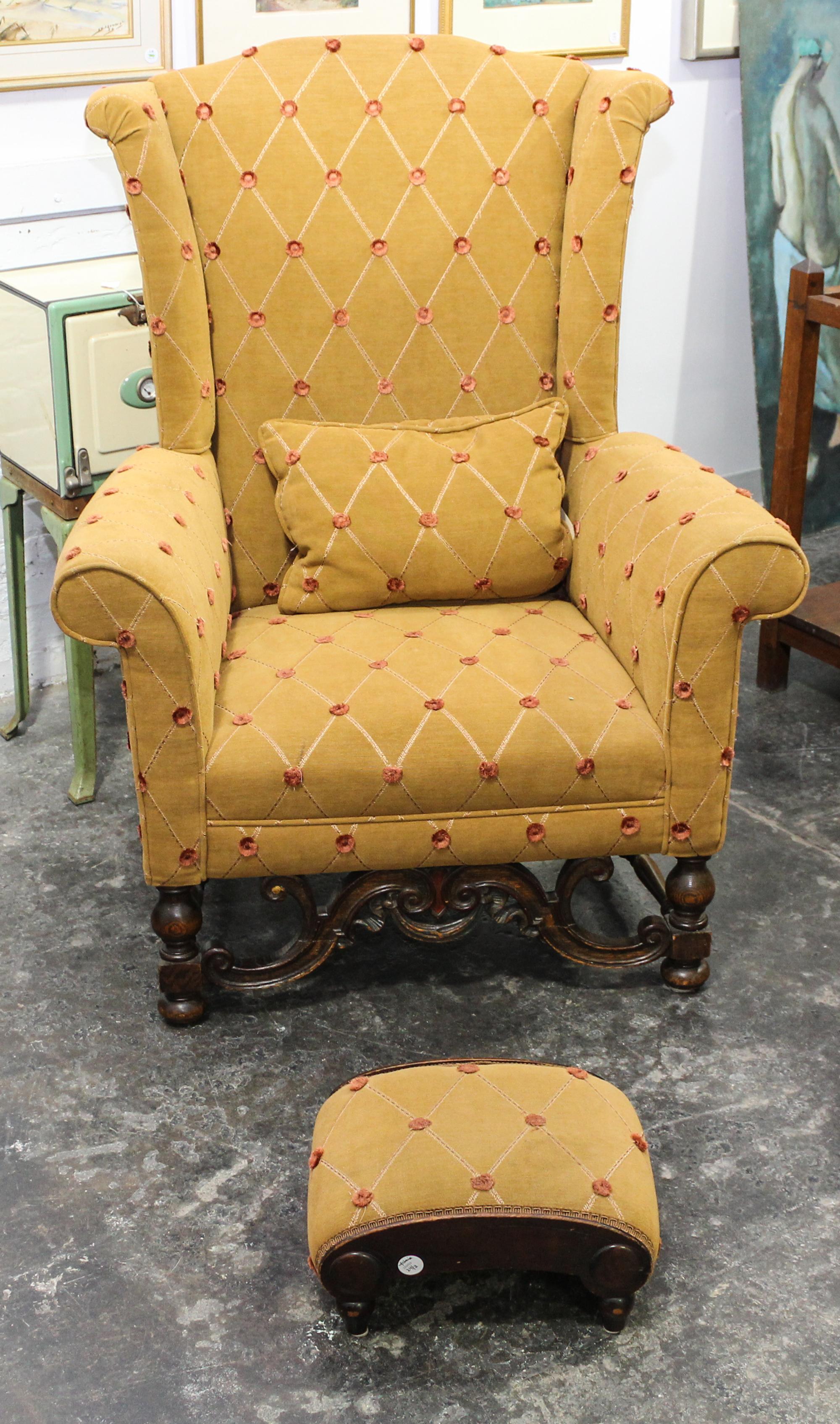 A Jacobean Style Oak Wingback Chair Height 45 1/2 inches. — 20TH CENTURY