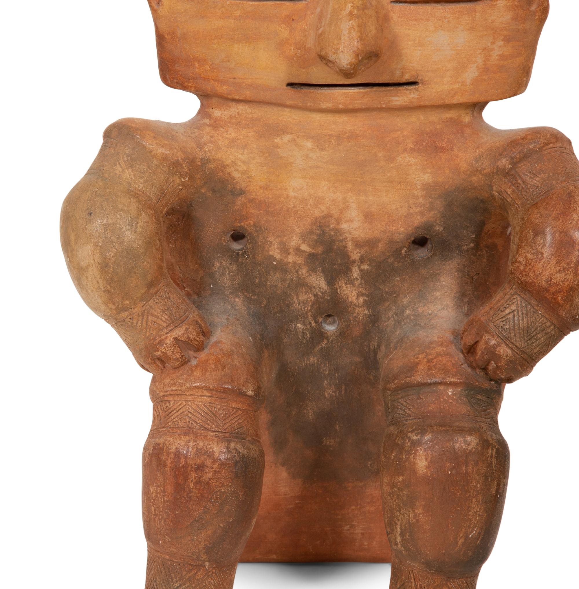 Two Quimbaya Style Pottery Seated Figures