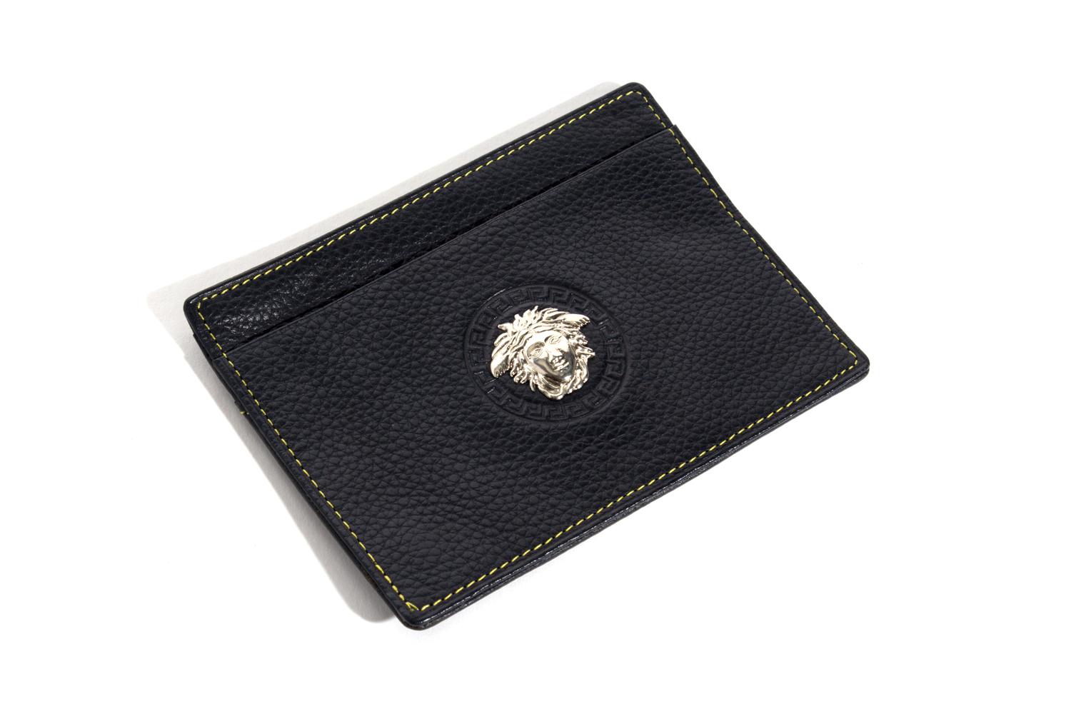 A Gianni Versace Black Embossed Leather Wallet, 4.47" x 3.5".