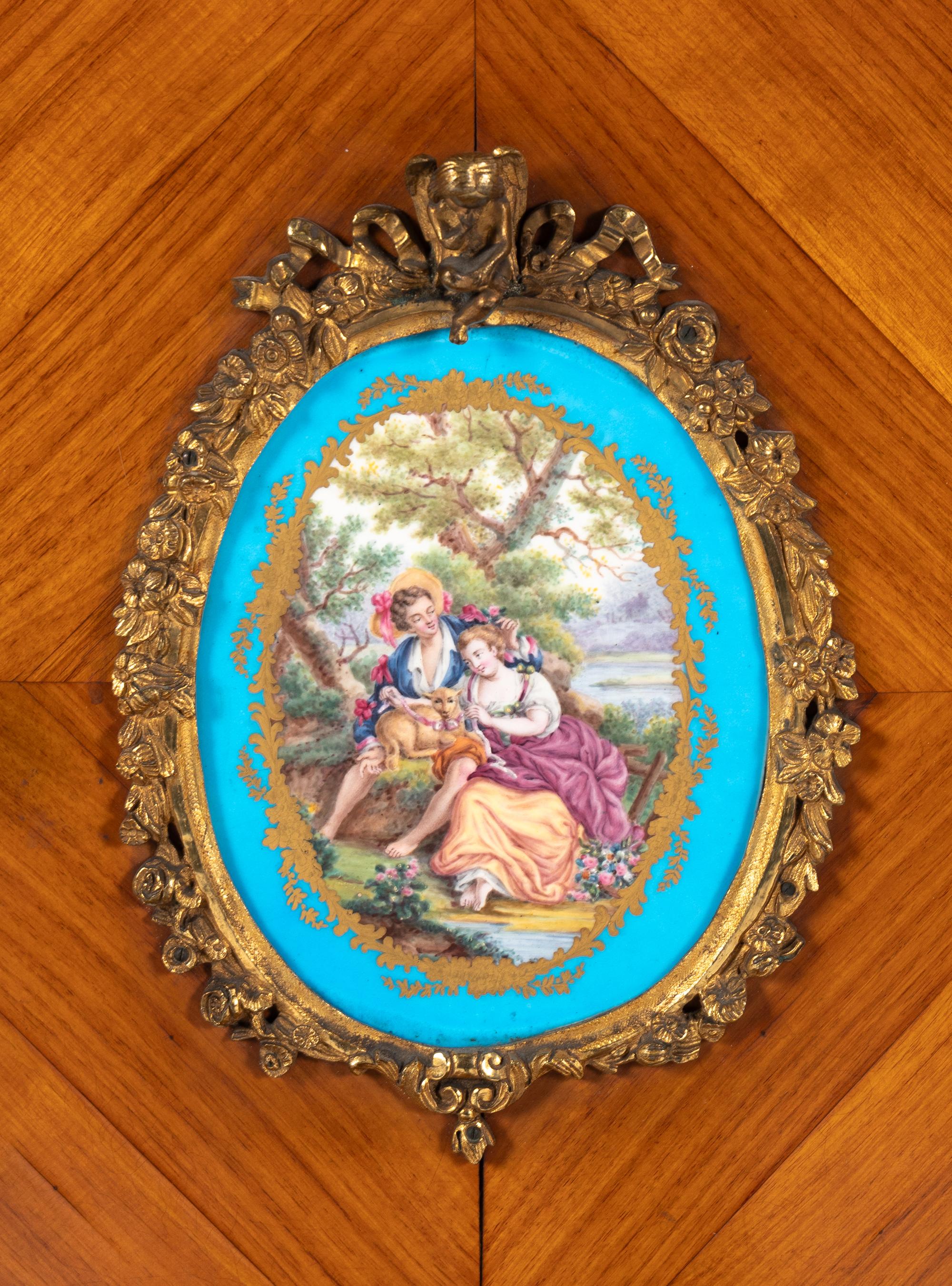 A Napoleon III Kingwood, Gilt Bronze Mounted and Porcelain Inset Bonheur du Jour