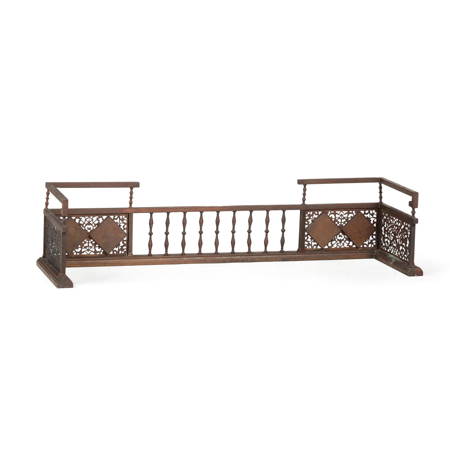 An Aesthetic Movement Fireplace Fender