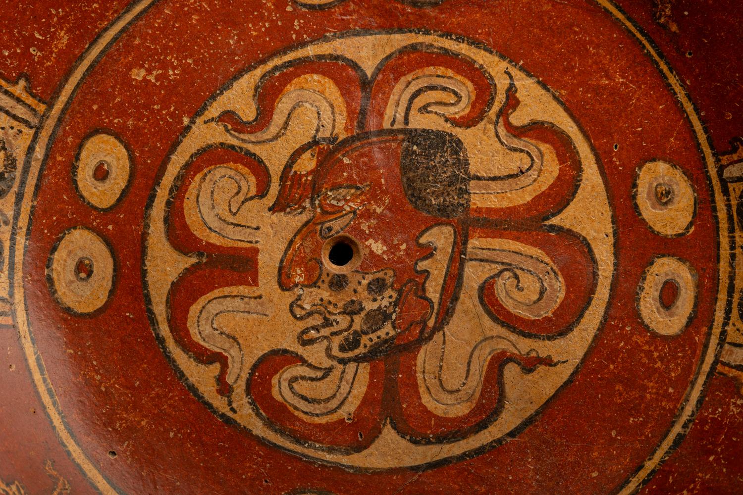 A Maya Polychrome Terracotta Tripod Plate with Gods and Glyphs