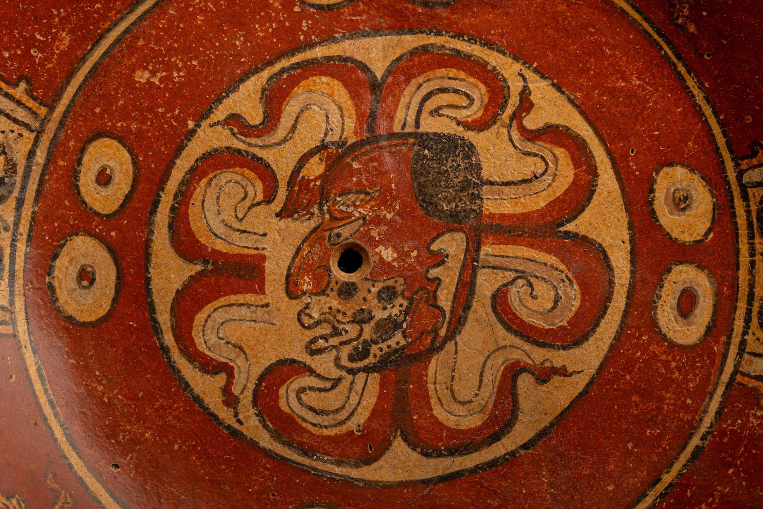 A Maya Polychrome Terracotta Tripod Plate with Gods and Glyphs
