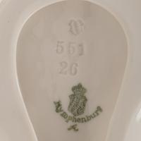 A Group of Twelve Nymphenburg Porcelain Equestrian Groups